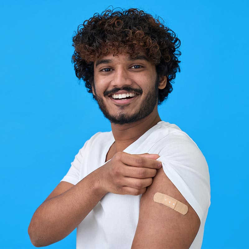 Man with a bandage on his arm