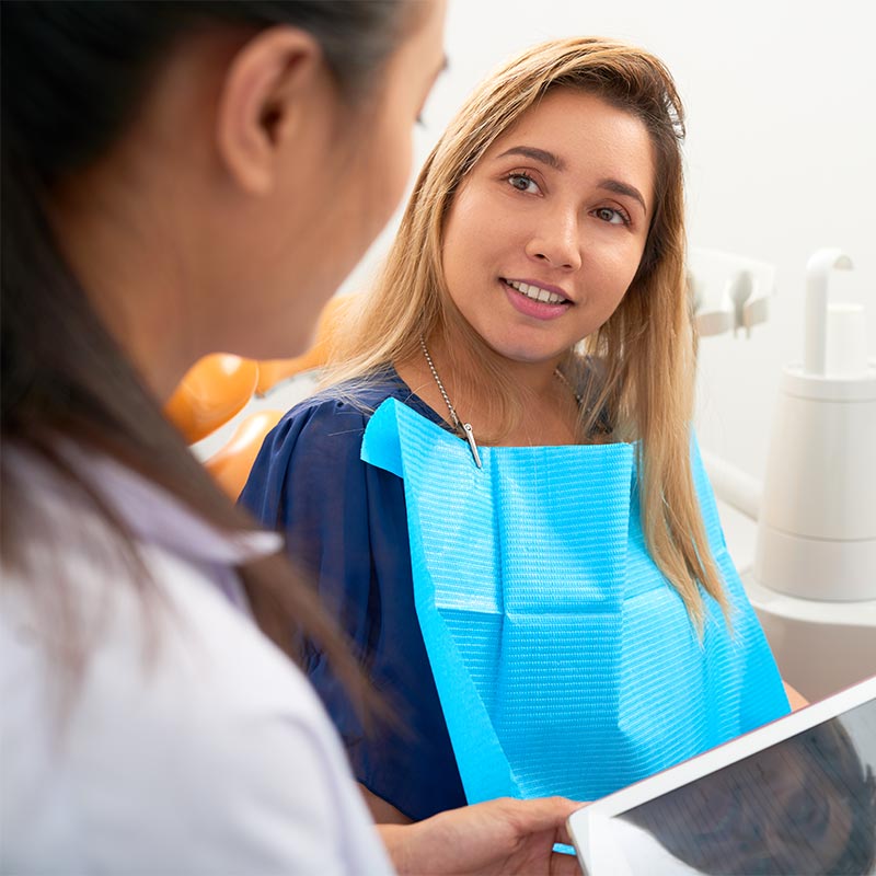 A dentist and her patient